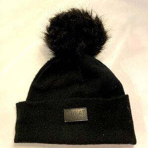 Black winter hat with Pompom, purchased from CycleBar